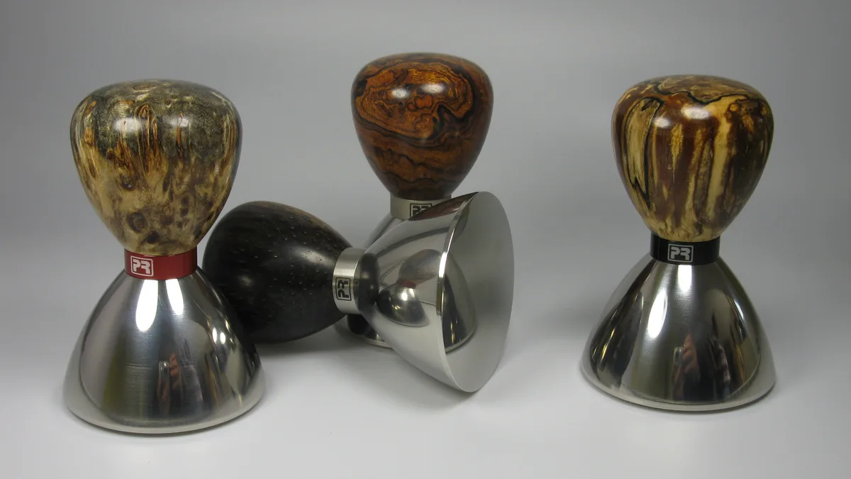 Calibrated spring tamper on 58mm stainless portafilter basket